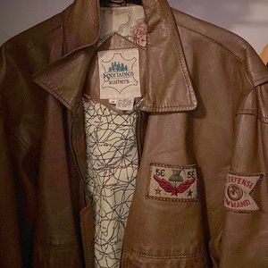 Vintage leather jacket-(spot tables leathers)-tarnish brownish-has patch work